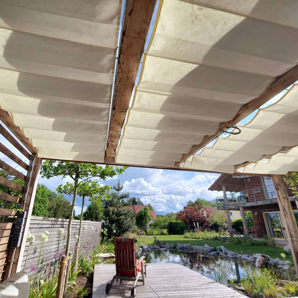 Pergolamarkisen-Seilpanntechnik mit Edelstahlseilen auf Maß im Pergholadach aus Holz mit Seeblick