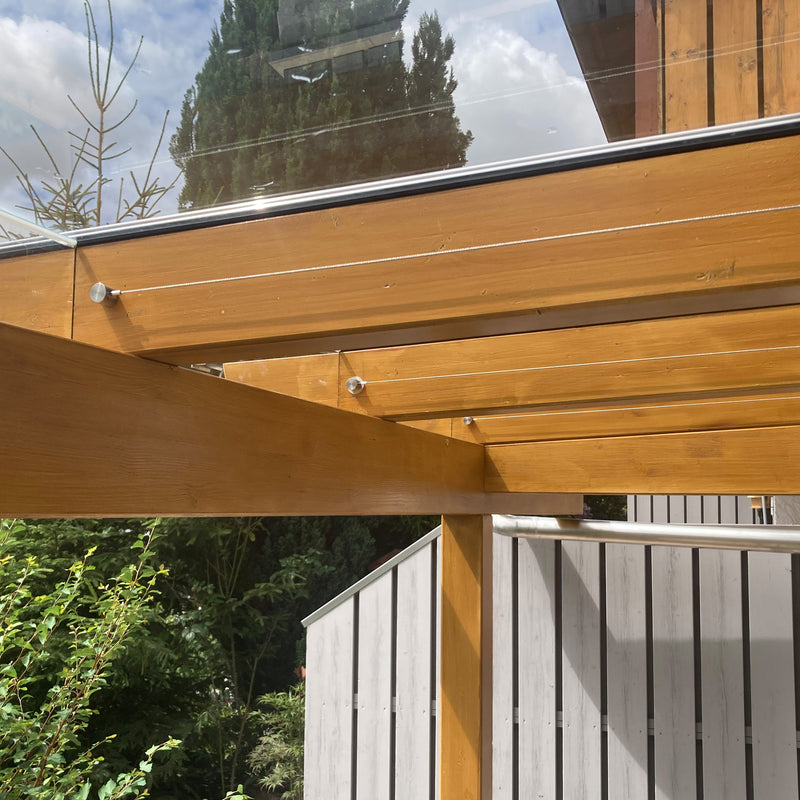 Spannseile aus Edelstahl im Holzdach