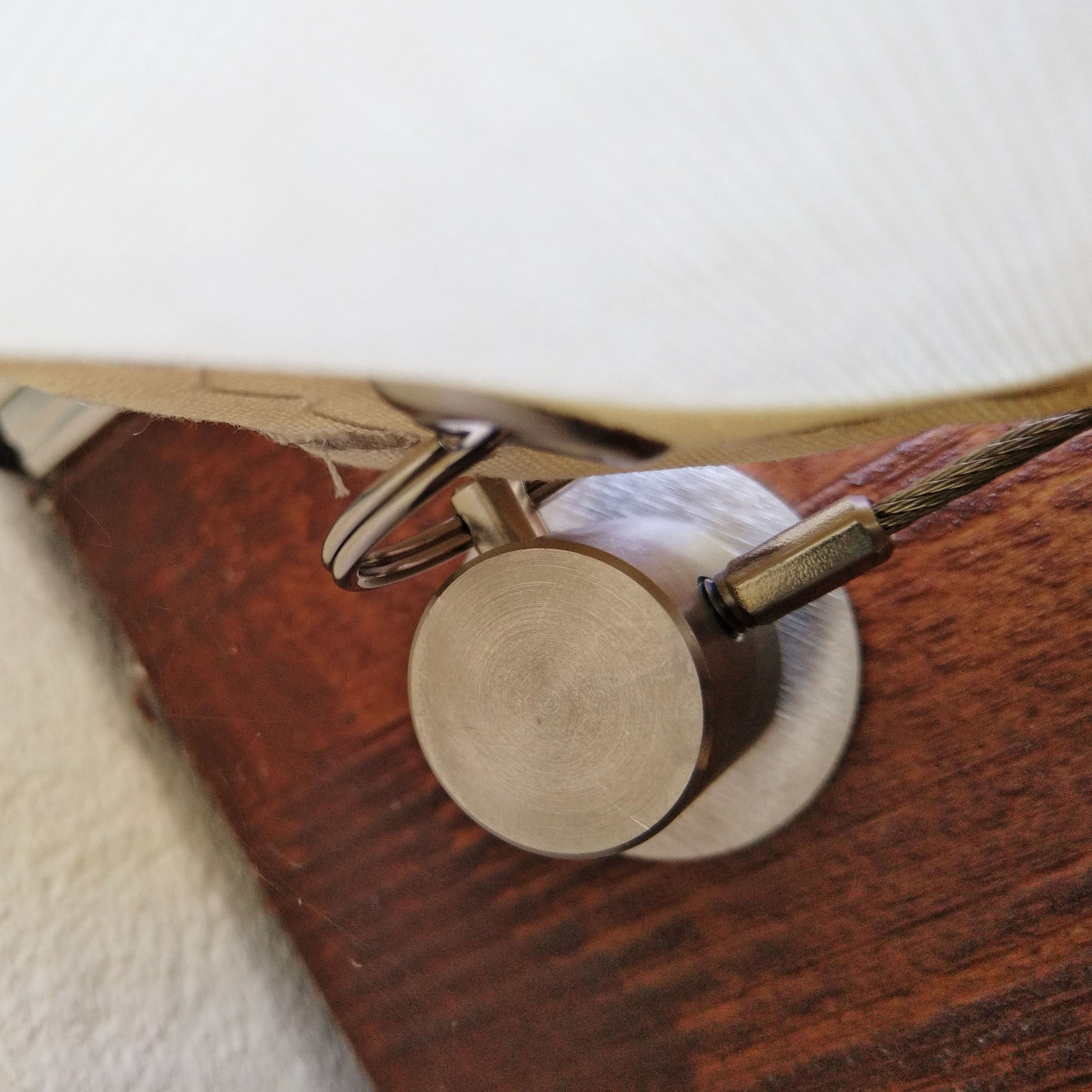 Edelstahlzylinder in Terrassendach-Beschattung mit Spannseil-System auf Maß